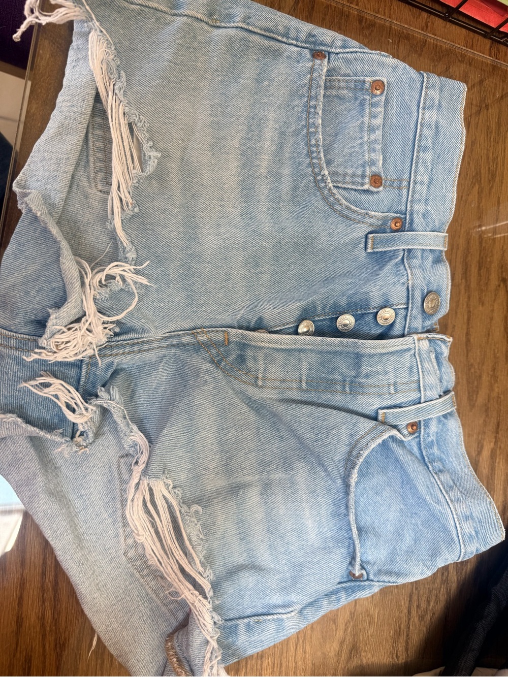 Levi's 501 high rise Light Blue Denim Jeans with White Lined Pocket. Like new